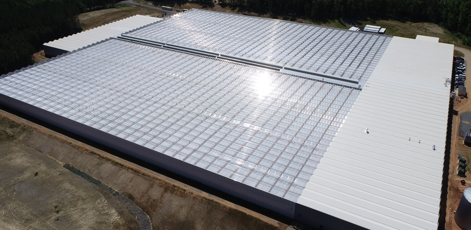 Aerial view of the Better Future Farms turnkey greenhouse built by Van der Hoeven in Australia, featuring large glass-covered structures for modern horticultural production.